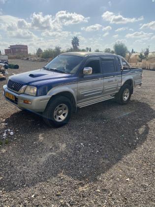 מיצובישי מאגנום 4X4 (2002)