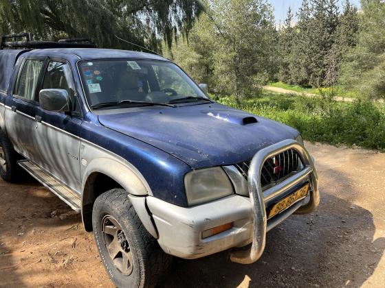 מיצובישי מאגנום 4X4 (2003)