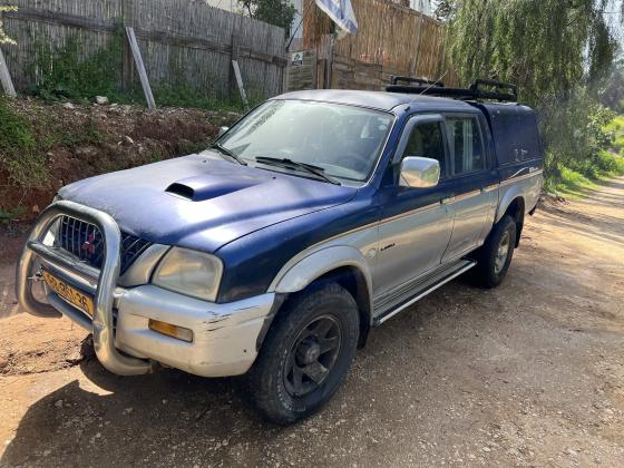 מיצובישי מאגנום 4X4 (2003)