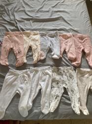 מגוון בגדי תינוקות במידות סמול