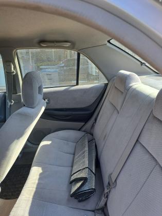 מאזדה 323 לאנטיס (2004)