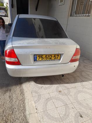 מאזדה 323 לאנטיס (2004)