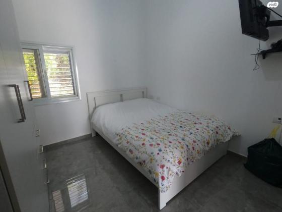 יצחק מוגזח 13 (מילצ'ן;שעריים)