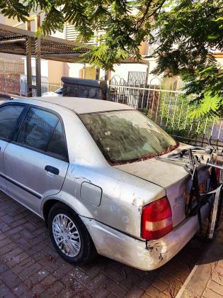 מאזדה 323 לאנטיס (2004)