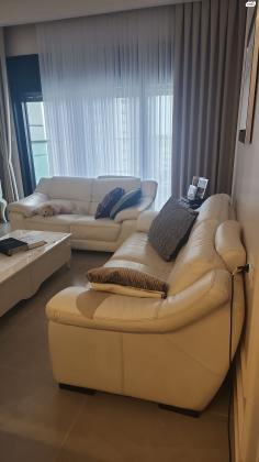 ספות עור בופאלו לבן של