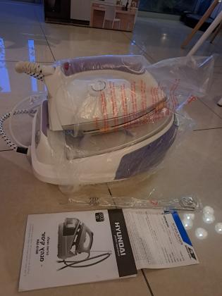 מגהץ קיטור חדש , מעולם לא היה בשימוש