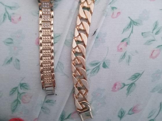 שעון עם אבנים צבע זהב וכסף לאחד