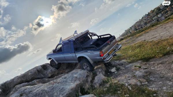 מיצובישי מאגנום 4X4 4X4 GLS דאבל קבינה אוט' דיזל 2.5 (115 כ''ס) דיזל 2002 למכירה בנהריה