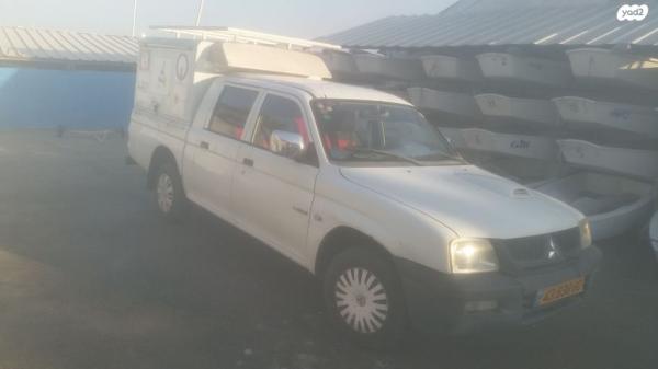 מיצובישי מאגנום 2X4 GL דאבל קבינה ידני דיזל 2.5 (90 כ''ס) דיזל 2006 למכירה בעכו