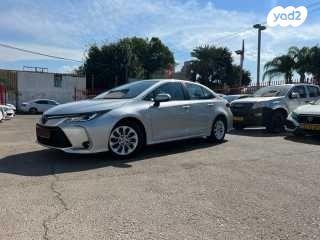 טויוטה קורולה הייבריד Comfort סדאן אוט' 1.8 (122 כ''ס) בנזין 2021 למכירה בתל אביב יפו