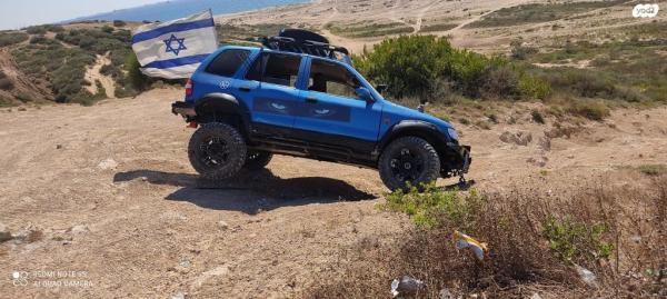 קיה ספורטז' 4X4 DLX אוט' 2.0 (128 כ''ס) בנזין 2000 למכירה בבת ים