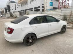 סקודה ראפיד Ambition אוט' 1.4 (122 כ"ס) בנזין 2014 למכירה בחולון