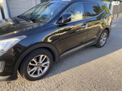 יונדאי סנטה פה 4X4 Supreme אוט' בנזין 7 מק' 2.4 (192 כ"ס) בנזין 2013 ל