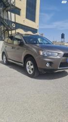 מיצובישי אאוטלנדר 4X4 Comfort אוט' 7 מק' 2.4 (170 כ"ס) [2010-2012] בנזין