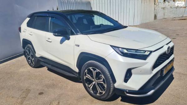 טויוטה RAV4 הייבריד 4X4 E-Motion פלאג-אין אוט' 2.5 (185 כ''ס) היברידי חשמל / בנזין 2022 למכירה ברמת גן