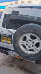 מיצובישי פג'רו ארוך 4X4 GLX אוט' דיזל 7 מק' 3.2 (165 כ''ס) דיזל 2002 