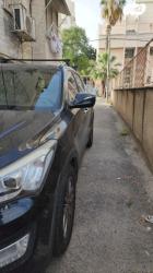 יונדאי סנטה פה 4X4 Premium אוט' בנזין 7 מק' 2.4 (192 כ"ס) בנזין 2013 ל