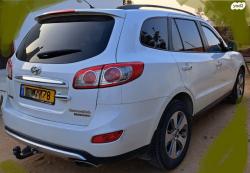 יונדאי סנטה פה 4X4 Luxury אוט' דיזל 7 מק' 2.2 (197 כ''ס) דיזל 2012 למכ