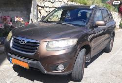 יונדאי סנטה פה 4X4 Executive אוט' בנזין 7 מק' 2.3 (174 כ''ס) בנזין 2010