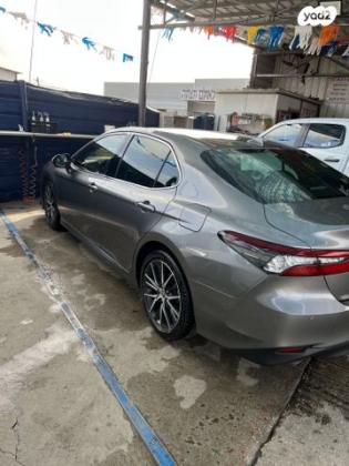 טויוטה קאמרי XLE הייבריד אוט' 2.5 (178 כ''ס) ק' 2 בנזין 2022 למכירה בניצני עוז