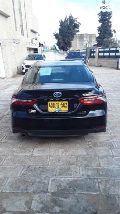 טויוטה קאמרי LE Plus הייבריד אוט' 2.5 (208 כ''ס) בנזין 2022 למכירה בירושלים