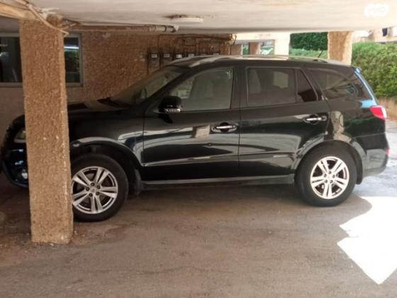 יונדאי סנטה פה 4X4 Executive אוט' בנזין 7 מק' 2.3 (174 כ''ס) בנזין 2012 למכירה בכפר סבא