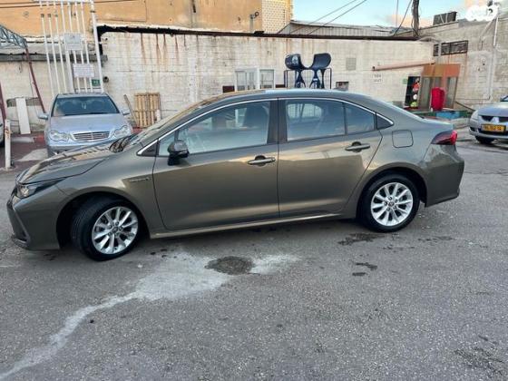 טויוטה קורולה הייבריד Comfort סדאן אוט' 1.8 (122 כ''ס) בנזין 2021 למכירה בבת ים