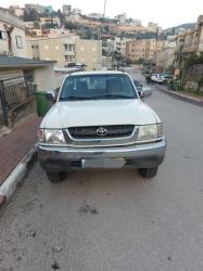 טויוטה היילקס 2X4 SR דאבל קבינה אוט' דיזל 2.5 (102 כ''ס) דיזל 2006