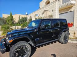 ג'יפ / Jeep רנגלר ארוך Unlim Rubicon 4XE אוט' הייב' 2.0 (270 כ''ס) ק' 1 היב