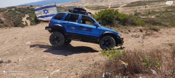 קיה ספורטז' 4X4 DLX אוט' 2.0 (128 כ''ס) בנזין 2000 למכירה בבת ים
