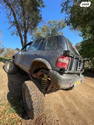 קיה ספורטז' 4X4 DLX ידני גג ברזנט 2.0 (128 כ''ס) בנזין 2002 למכירה בקרית אתא