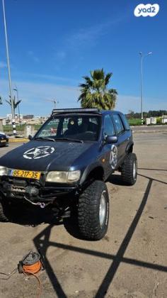קיה ספורטז' 4X4 DLX ידני גג ברזנט 2.0 (128 כ''ס) בנזין 2002 למכירה בקרית אתא