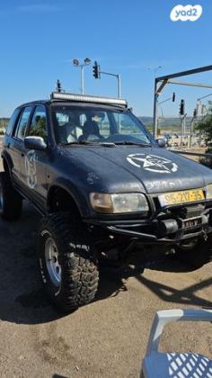 קיה ספורטז' 4X4 DLX ידני גג ברזנט 2.0 (128 כ''ס) בנזין 2002 למכירה בקרית אתא