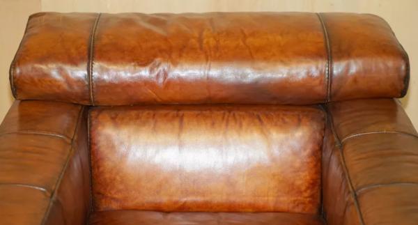 כורסת עור חום סיגר NATUZZI