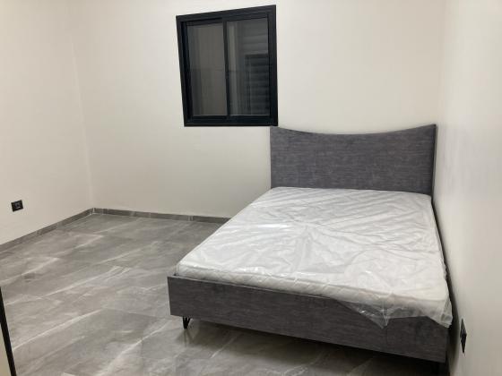 יל"ג 12, הדר הכרמל