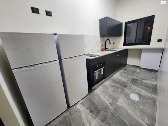 יל"ג 12, הדר הכרמל