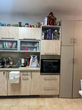 בשכונת הל"ה