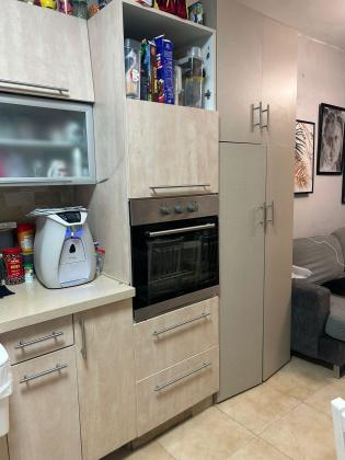 בשכונת הל"ה