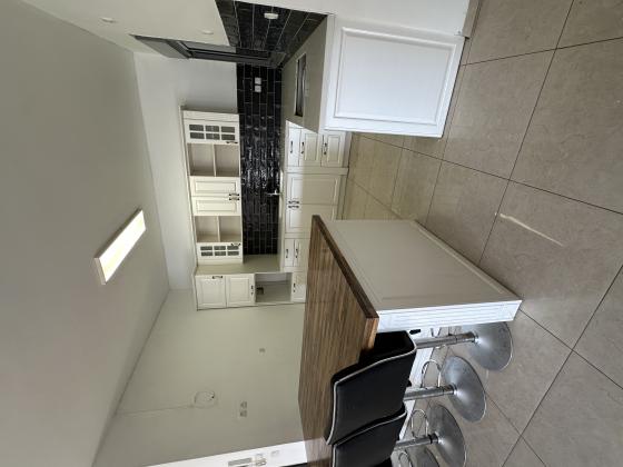 הרב פרץ ציוני 35, מרכז העיר